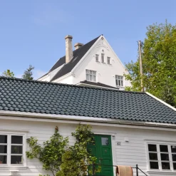 RT855 Laumans vingefalstagsten, malakit-grøn glaseret